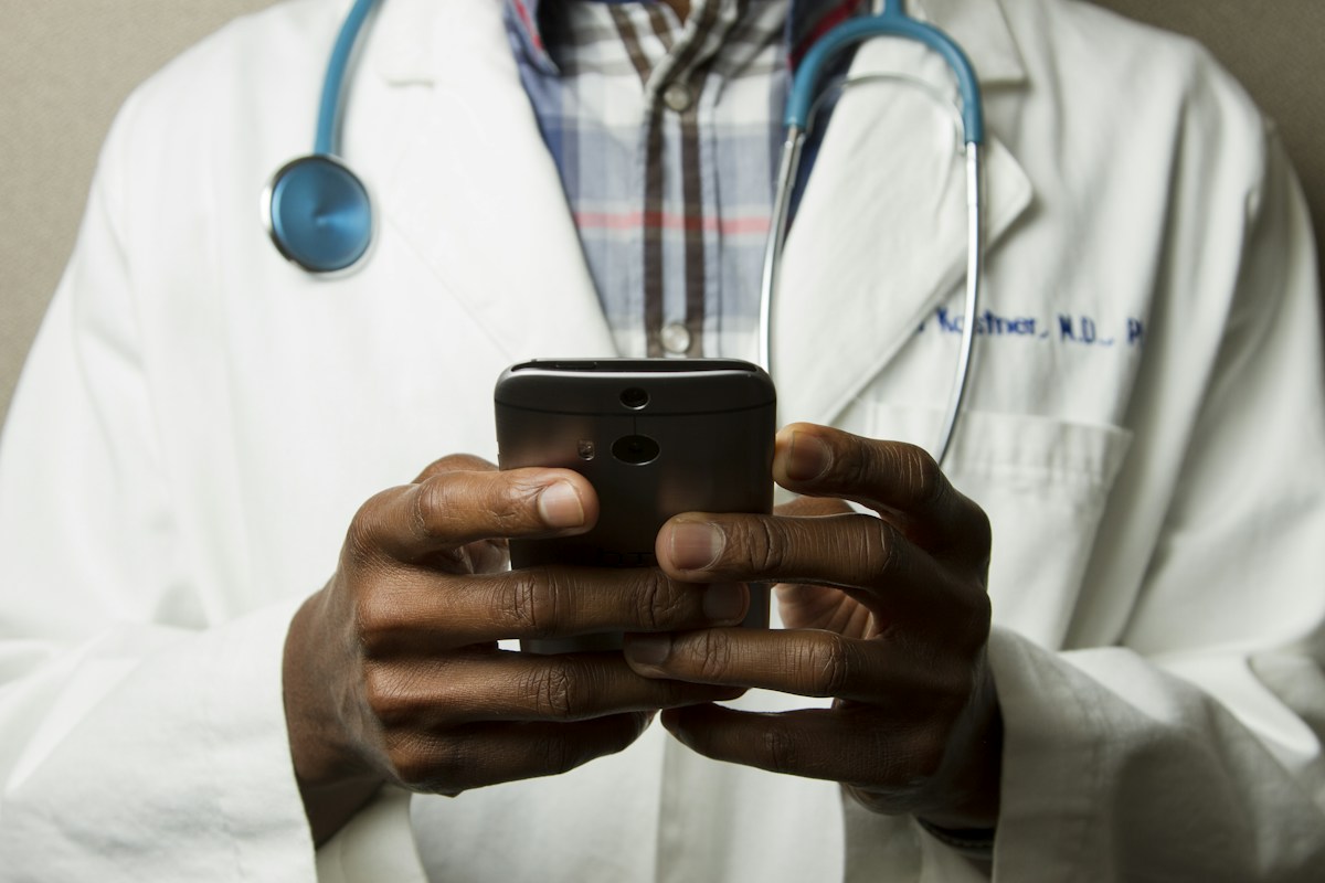 A clinician reviewing information