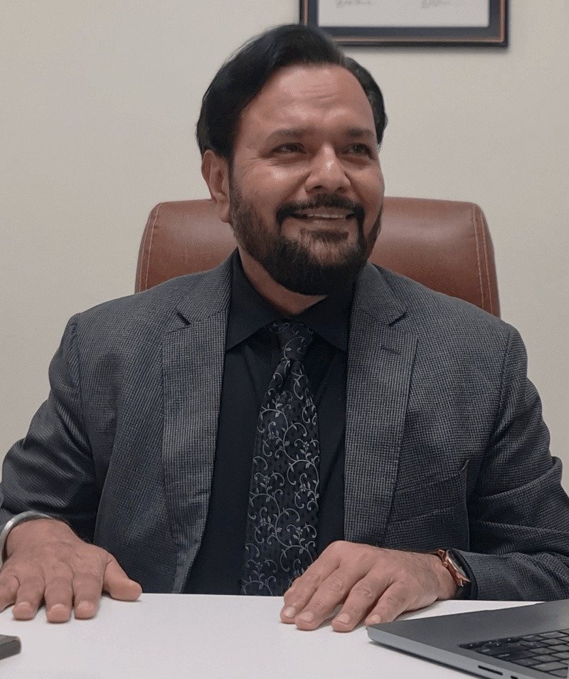 Dr. Sandhu in his consultation room