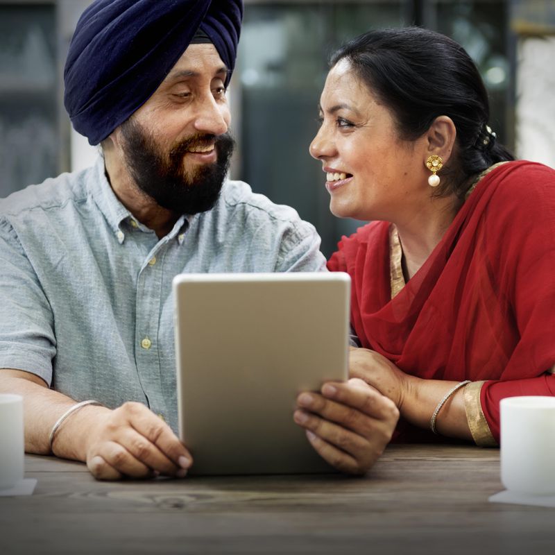 A couple reviewing information together